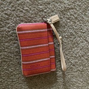Coach wristlet. Multi color
